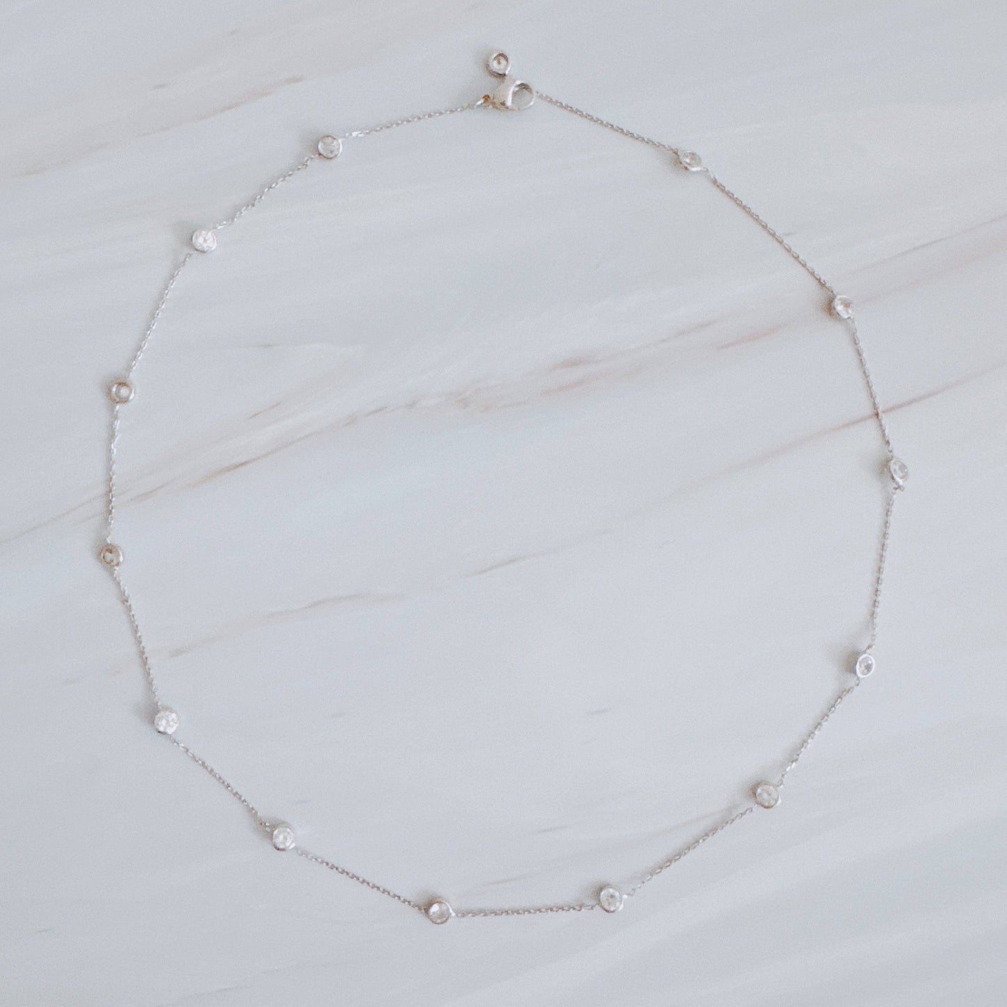 A Dozen Of Bezel Sparkle Station Necklace